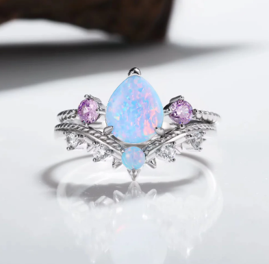 Handcrafted Harmony: How Opal Fire Meets Amethyst Depth in the April Ring Set